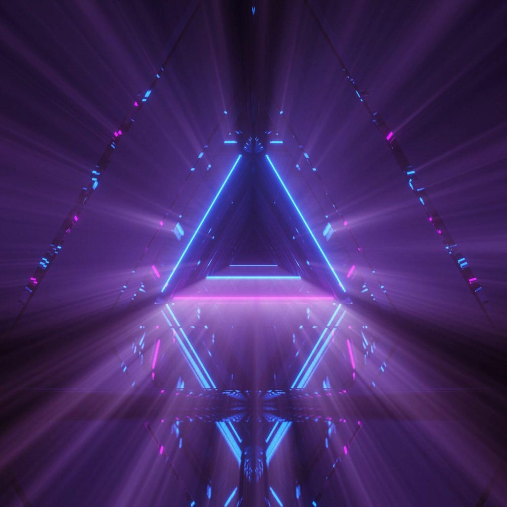 A laser show of glowing lines of neon lights with a black background